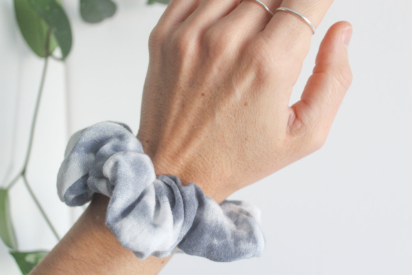 Tie dye blue scrunchie with a zipper