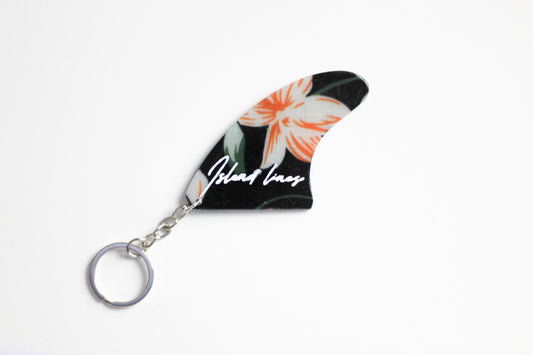 Fin shaped dark flowers key chain