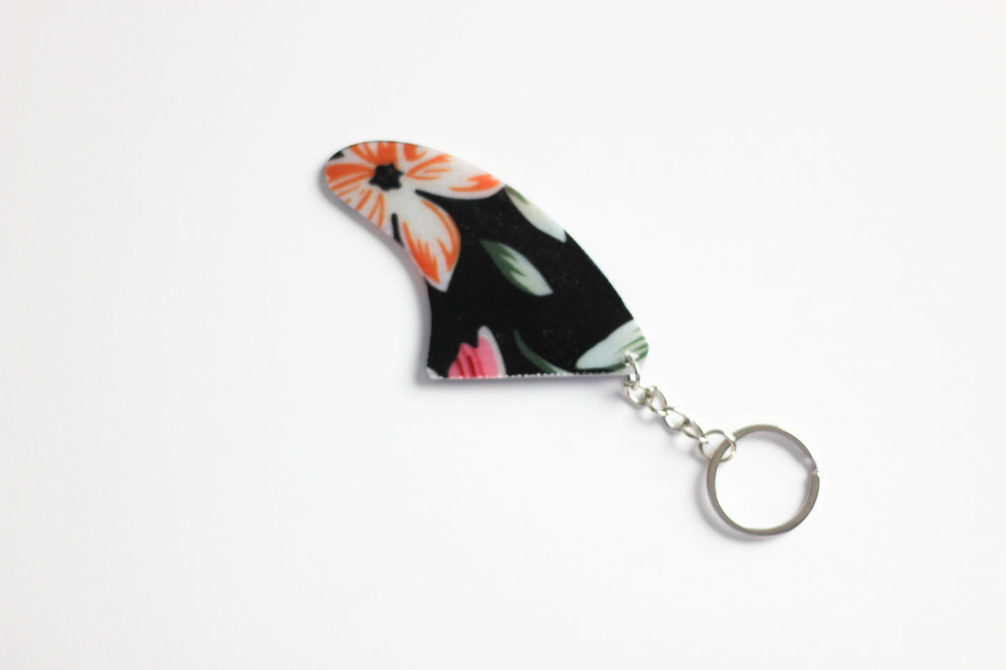 Fin shaped dark flowers key chain