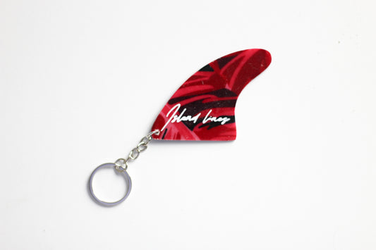 Fin shaped pinky key chain