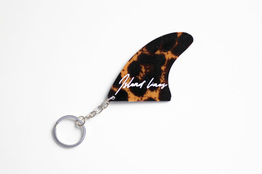 Fin shaped leopard key chain