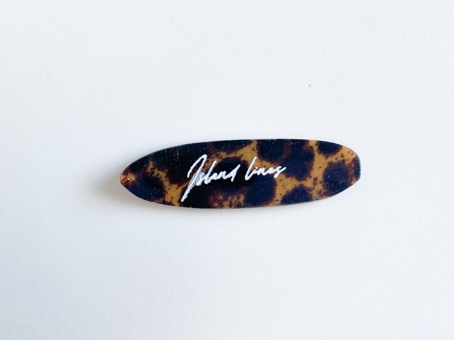 Surf shaped leopard magnet