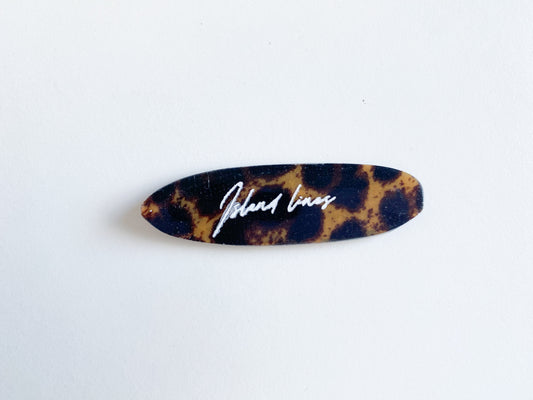Surf shaped leopard magnet