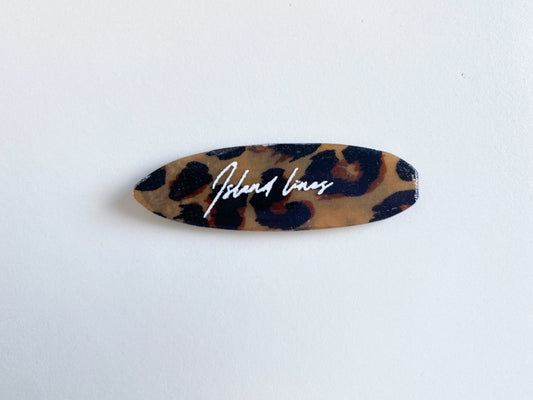 Surf shaped leopard magnet